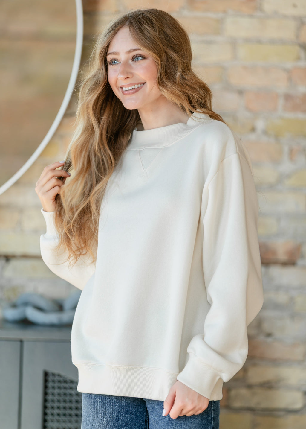 Things Between® Nelly Mock Neck Cream Sweatshirt