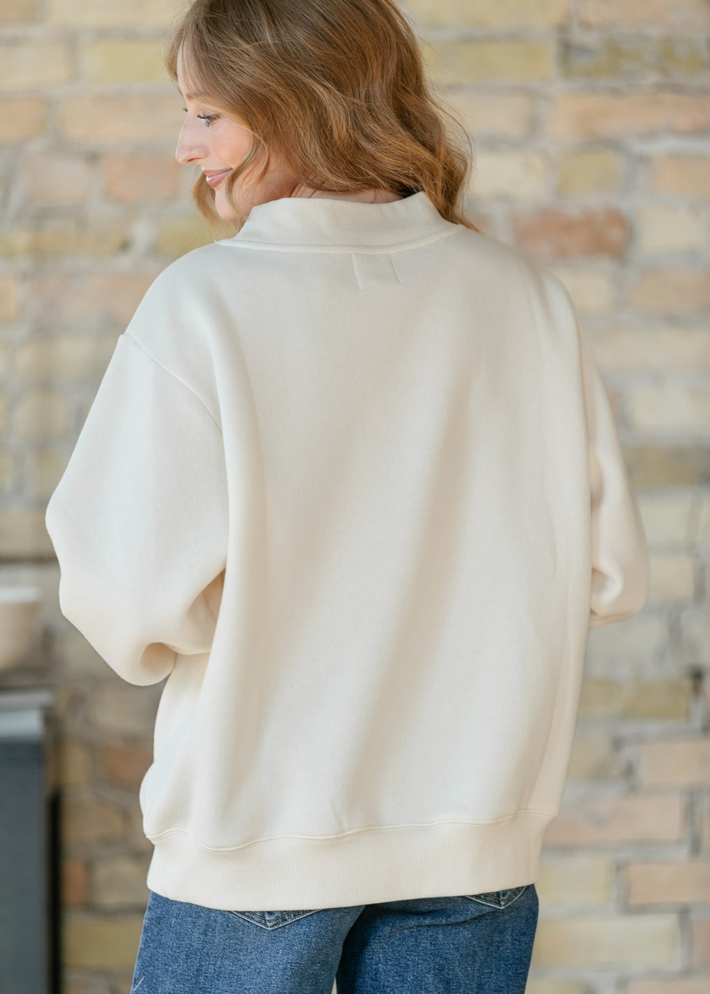 Things Between® Nelly Mock Neck Cream Sweatshirt