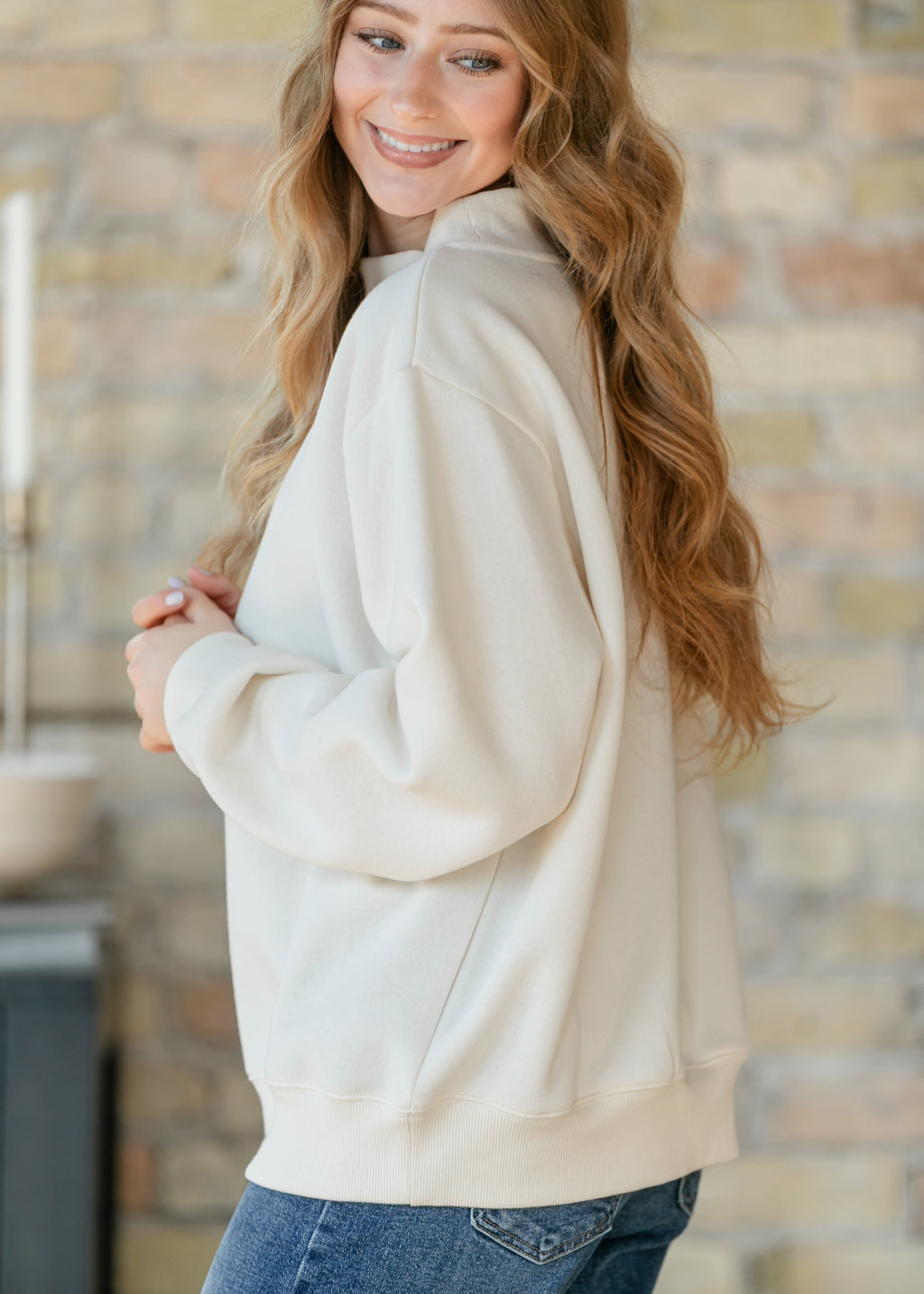 Things Between® Nelly Mock Neck Cream Sweatshirt